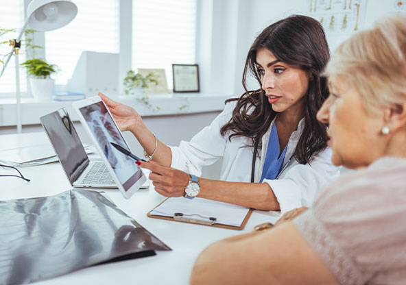 Doctor Showing Scan to patient